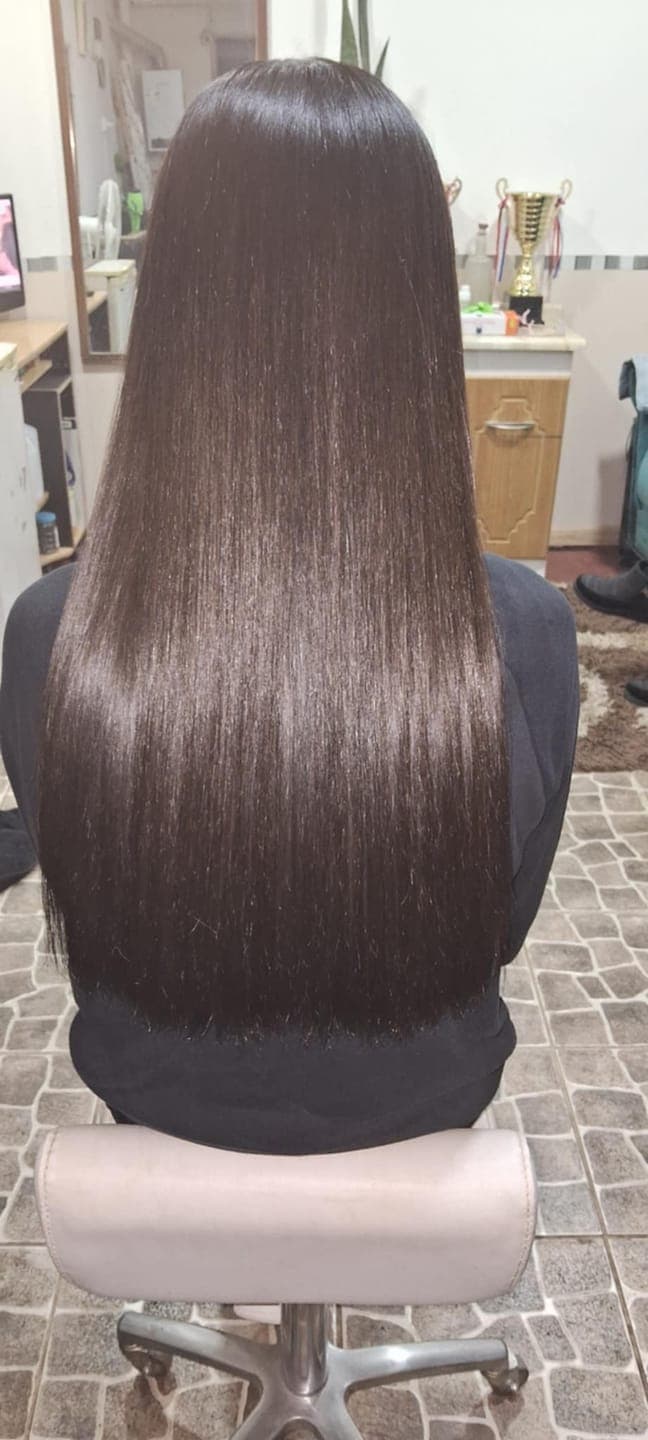 Foto de Dominga B. usando Shampoo Antifrizz 300 ml