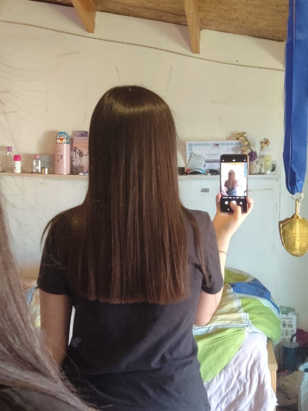 Foto de Agustina R. usando Acondicionador Post-Alisado 300 ml