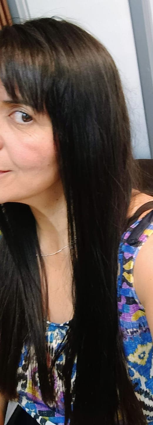 Foto de Pamela P. usando Protector Térmico Antifrizz 120 ml