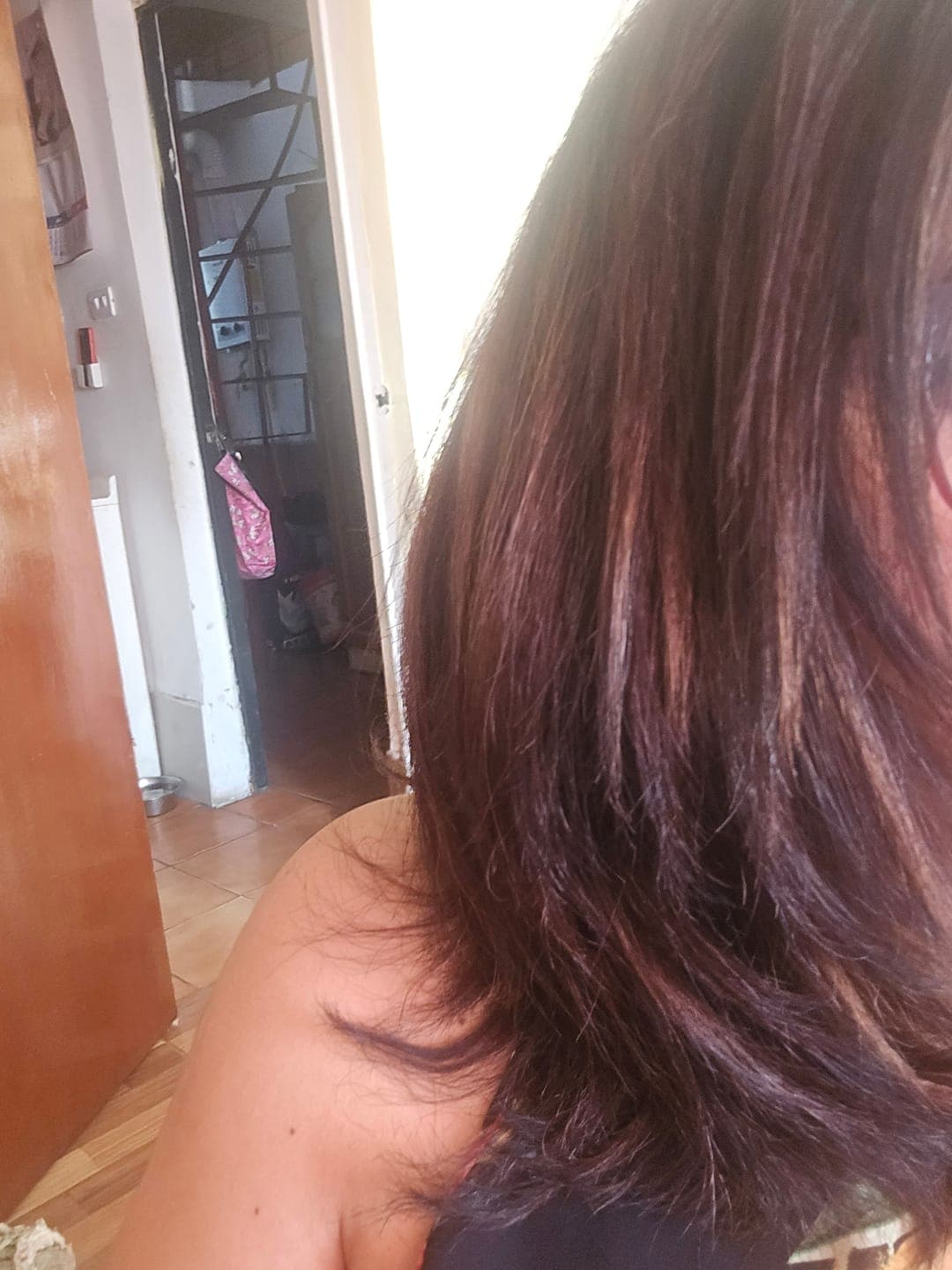 Foto de Beatriz A. usando Protector Térmico Antifrizz 120 ml