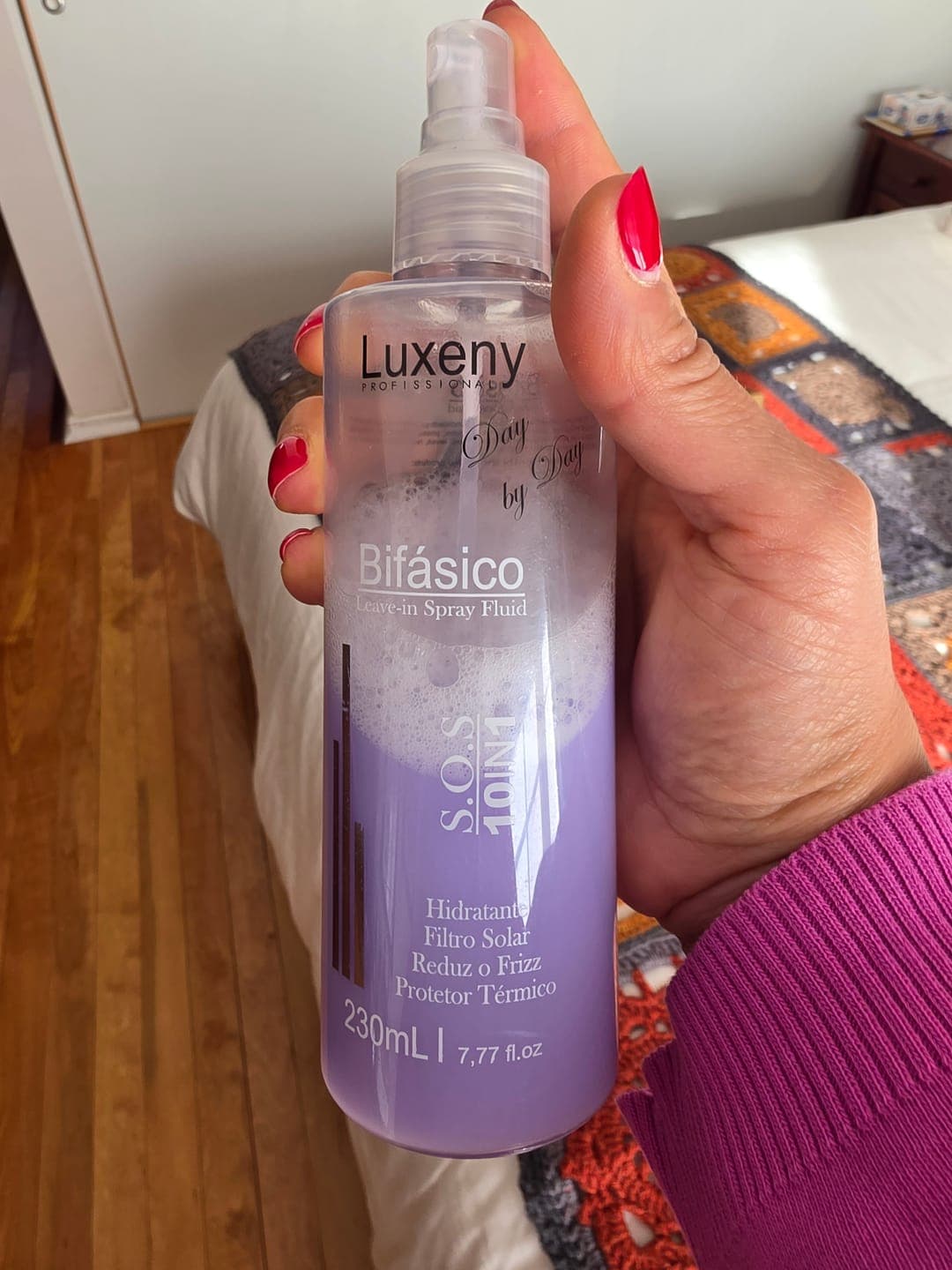 Foto de Alejandra B. usando Spray Bifásico 10 en 1 230 ml